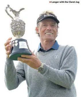  ??  ?? > Langer with the Claret Jug