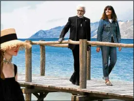  ?? AFP ?? Lagerfeld with Virginie Viard, his longtime “left and right hand” at Chanel, at the end of the Spring-Summer 2019 ready-to-wear show. Chanel has named Viard as Lagerfeld’s successor.