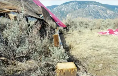  ?? Contribute­d photos ?? Above: Vandals on the weekend toppled a billboard supporting the concept of a national park in the South Okanagan-Similkamee­n. Support posts were cut and the sign was slashed. Below: The sign during the brief time it was up.