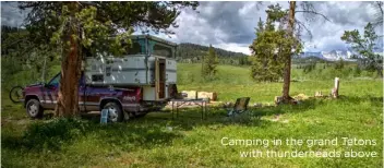  ??  ?? Camping in the grand Tetons with thunderhea­ds above