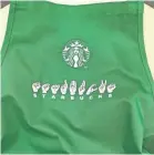  ?? STARBUCKS ?? Deaf baristas at the Signing Store in Washington will wear ASL aprons from a deaf supplier.