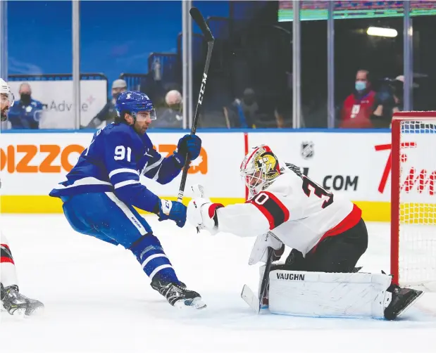  ?? JOHN E. SOKOLOWSKI / USA TODAY SPORTS ?? Senators goaltender Matt Murray makes a stop against Maple Leafs forward John Tavares at Scotiabank Arena on Wednesday.