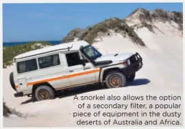  ??  ?? A snorkel also allows the option of a secondary filter, a popular piece of equipment in the dusty deserts of Australia and Africa.