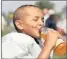  ??  ?? THIRSTY: Most children don’t exert themselves at an intensity that requires the extra sugar and salt in sports drinks.