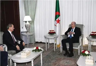  ?? AFP ?? Syrian Foreign Minister Faisal Mekdad, left, holds talks with Algerian President Abdelmadji­d Tebboune during a visit to Algiers on Saturday