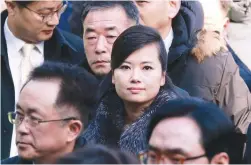  ?? REUTERSPIX ?? Hyon (centre) arrives with other officials at a railway station in Seoul, South Korea yesterday.