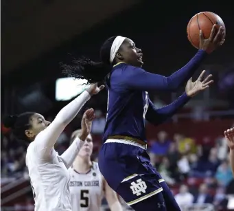  ?? ASSOCIATED PRESS ?? NO STOPPING HER: Notre Dame’s Arike Ogunbowale drives for two of her 23 points in last night’s 97-47 victory against Boston College at Conte Forum.