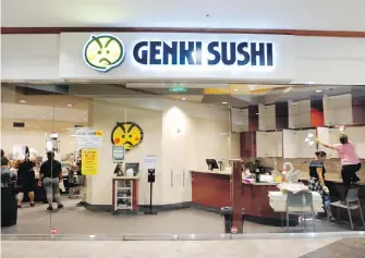  ??  ?? Employees clean a Genki Sushi restaurant this week in Aiea, Hawaii. Genki Sushi was ordered to close its 10 restaurant­s on Oahu and one on Kauai after state authoritie­s identified its raw scallops as the probable source of a hepatitis A outbreak.