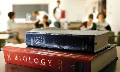  ??  ?? The draft law says a teacher ‘shall not penalize or reward a student based on the religious content of a student’s work’ – language strikingly similar to Project Blitz’s model legislatio­n. Photograph: Justin Lane/EPA