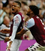  ?? ?? KEY MAN: Leon Bailey celebrates Aston Villa’s second goal with team-mate Tyrone Mings