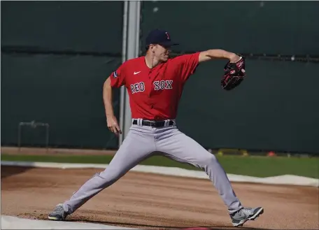  ?? BRYNN ANDERSON — THE ASSOCIATED PRESS ?? Boston Red Sox starting pitcher Nick Pivetta runs a drill at spring training baseball practice on Friday, Feb. 17, 2023, in Fort Myers, Fla.