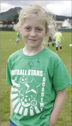 ??  ?? Lucy Cooper enjoying the Football Stars Summer Club at Wolfetone Youth Club.