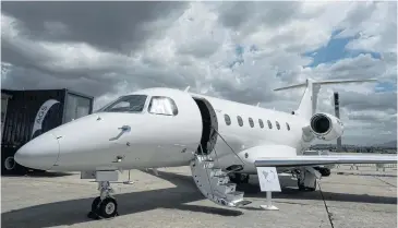  ?? AFP ?? Embraer SA’s mid-sized executive jet Legacy 500 is exhibited during the first edition of the Internatio­nal Brazil Air Show at Tom Jobim internatio­nal airport, known as Riogaleao, in Rio de Janeiro on Wednesday.
