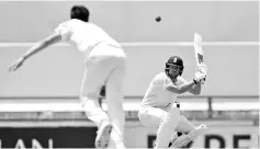  ??  ?? England batsman Dawid Malan (right) ducks under a bouncer from Australia’s bowler Pat Cummins (left) on day five of the third Ashes cricket Test match between England and Australia in Perth on December 18, 2017. - AFP photo