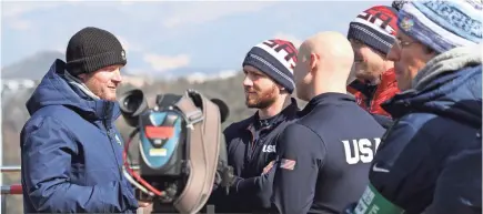  ?? GEOFF BURKE/USA TODAY SPORTS ?? NBC correspond­ent Dale Earnhardt Jr., visits with members of the U.S. bobsled team.