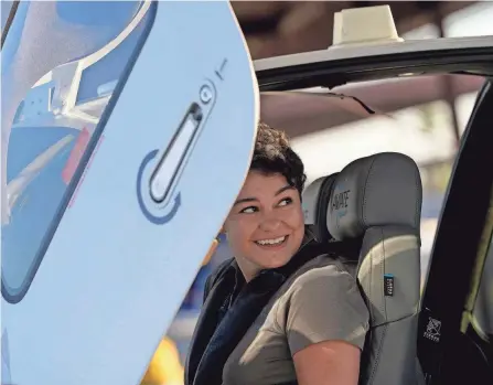  ?? MATT YORK/AP ?? United Aviate Academy student pilot Ashley Montano inspects her aircraft prior to a flight in Goodyear, Ariz., last year. Montano hopes that in a few years she will be flying airline jets.