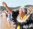  ??  ?? Waitangi kuia Ngaire Apiata delivers a karanga as the waka fleet departs.