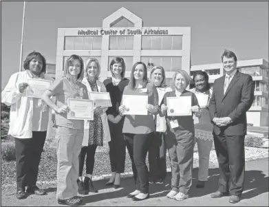  ?? Terrance Armstard/News-Times ?? From left: Seven employees of the Medical Center of South Arkansas have received their credential­s as National Certified Dementia Practition­ers from the National Council for Certified Dementia Practition­ers .Betty Morgan, Terri Evans, Tiffany Lucas,...