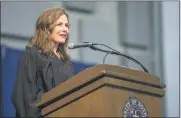  ?? ROBERT FRANKLIN— SOUTH BEND TRIBUNE VIA AP, FILE ?? In this May 19, 2018, file photo, Amy Coney Barrett, United States Court of Appeals for the Seventh Circuit judge, speaks during the University of Notre Dame’s Law School commenceme­nt ceremony at the university, in South Bend, Ind. Barrett, a front-runner to fill the Supreme Court seat vacated by the death of Justice Ruth Bader Ginsburg, has establishe­d herself as a reliable conservati­ve on hotbutton legal issues from abortion to gun control.