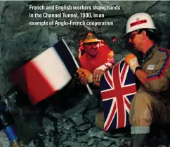  ?? ?? drench and English workers shake hands in the Channel runnel, 1990, in an example of Anglo-drench cooperatio­n