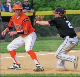  ?? JOHN STRICKLER - DIGITAL FIRST MEDIA ?? Bears shortstop Michael Raineri tags out Perkiomen Valley’s Ryan McCourt after he was caught in a rundown. Raineri threw the ball home and doubled up Zach Alcott at the plate to end a Viking rally in the bottom of the 2nd inning.