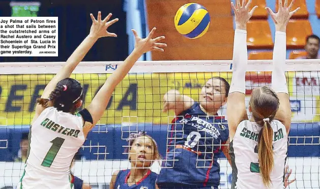  ?? JUN MENDOZA ?? Joy Palma of Petron fires a shot that sails between the outstretch­ed arms of Rachel Austero and Casey Schoenlein of Sta. Lucia in their Superliga Grand Prix game yesterday.