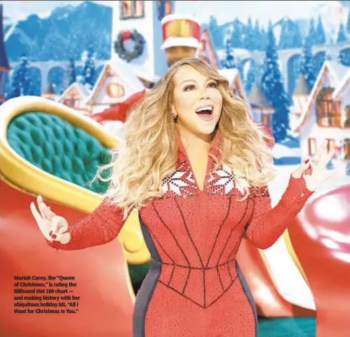  ?? ?? Mariah Carey, the “Queen of Christmas,” is ruling the Billboard Hot 100 chart — and making history with her ubiquitous holiday hit, “All I Want for Christmas Is You.”