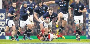  ??  ?? Stuart Hogg in action during Scotland’s last visit to Cardiff in 2016.