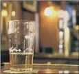  ??  ?? Pubs play a vital role in communitie­s, but are hard-hit by taxes.
