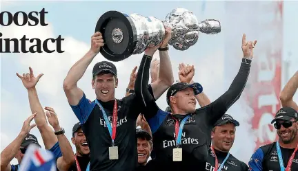  ?? PHOTO: MIKE SEGAR/REUTERS ?? Team New Zealand helmsman Peter Burling, left, and skipper Glenn Ashby celebrate their recent America’s Cup win.