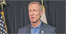  ??  ?? Bruce Rauner announces Sept. 29 he will sign the abortion bll. | ASHLEE REZIN/ SUN- TIMES