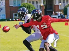 ?? JOHN BAZEMORE / ASSOCIATED PRESS ?? Falcons defensive back Blidi Wreh-Wilson breaks up a pass intended for wide receiver Christian Blake during training camp last year. He’s won over the coaching staff by staying ready and playing well when called upon.