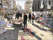  ?? Hadi Mizban Associated Press ?? THE SUICIDE BOMBINGS that struck Baghdad’s Bab Sharqi market on Thursday were the first such attack in the Iraqi capital since January 2018.