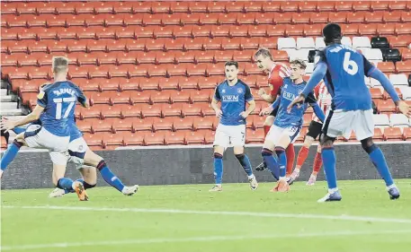  ??  ?? Jack Diamond scores his first senior goal against Carlisle United