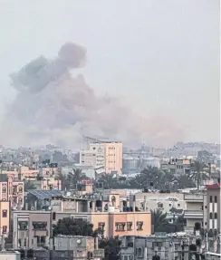  ?? PICTURE: SAID KHATIB/AFP VIA GETTY IMAGES ?? A picture taken from Rafah shows smoke over Khan Yunis in the southern Gaza Strip during Israeli bombardmen­t