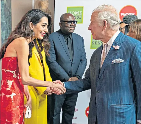  ?? ?? The Prince of Wales meets Amal Clooney as he attends the Prince’s Trust Awards, which will be broadcast on television tomorrow for the first time in the event’s 18-year history