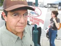  ?? STAFF PHOTO BY TIM BARBER ?? Blackwell Smith, longtime resident and business owner in Walker County, does not want a Pilgrims’ Pride chicken plant in McLemore Cove. Smith and others made their thoughts known along West Main Street on Thursday across from the Broad Street plant in...