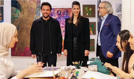  ?? Supplied ?? Earlier this year, Crown Prince Hussein and Rajwa Al-Saif visited the ‘Fragrance of Colors’ initiative in Amman, which teaches the blind and visually impaired how to create art.