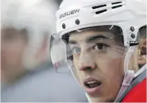  ?? COLLEEN DE NEVE/CALGARY HERALD ?? The Flames’ Johnny Gaudreau watches drills as he takes a breather while the team practices. After a break, the Flames are eager to start the secondroun­d playoff series.