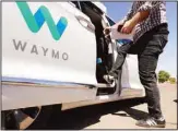  ?? (AP) ?? In this file photo, a Waymo minivan arrives to pick up passengers for an autonomous vehicle ride, in Mesa, Arizona.