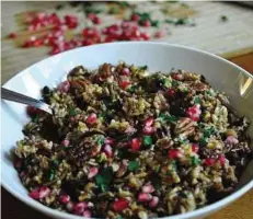  ??  ?? Wild Rice with Chorizo, Walnuts and Pomegranat­e