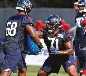  ?? Brett Coomer / Staff photograph­er ?? Tytus Howard, right, and the Texans are expecting big things from the right tackle if he remains healthy this season. Howard was a first-round pick in 2019.