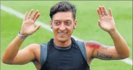  ?? GETTY ?? German Football Associatio­n chief Reinhard Grindel has said he should have stepped in firmly to end the abuse against Mesut Ozil over a controvers­ial photograph with Turkish President Recep Erdogan.