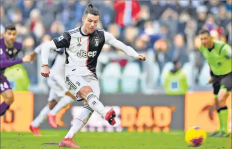  ?? AP ?? Cristiano Ronaldo scores off a penalty against Fiorentina in Serie A on Sunday. Ronaldo has scored 50 goals for Juventus across competitio­ns in the last two seasons. n