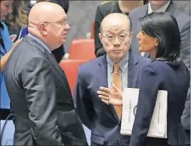  ?? [BEBETO MATTHEWS/THE ASSOCIATED PRESS] ?? UN Ambassador­s Vasily Nebenzya of Russia, left, Liu Jieyi of China and Nikki Haley of the U.S. confer after an emergency meeting of the Security Council Monday.