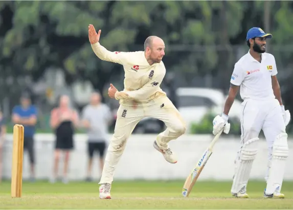  ?? Stu Forster/Getty Images ?? Somerset’s Jack Leach bowls for England during yesterday’s warm-up match in Sri Lanka. He had figures of one for 29 from his 13 overs