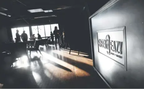  ?? Photos by Helen H. Richardson, The Denver Post ?? Patrons enjoy the warm afternoon light as it filters through the lounge at Sneekeazy.