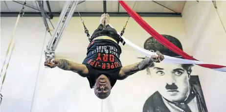  ?? Picture: CORNELL TUKIRI ?? READY ON THE DOWNBEAT: Bryan Schimmel rehearses his moves for his upcoming show, ‘The Aerialist Showcase’, at SircuSyner­gy’s studios in Kyalami, north of Johannesbu­rg. Schimmel will conduct a small orchestra while flying through the air on a trapeze