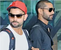  ??  ?? CONFIDENT: Skipper Virat Kohli and Shikhar Dhawan on eve of departure to Bangladesh.