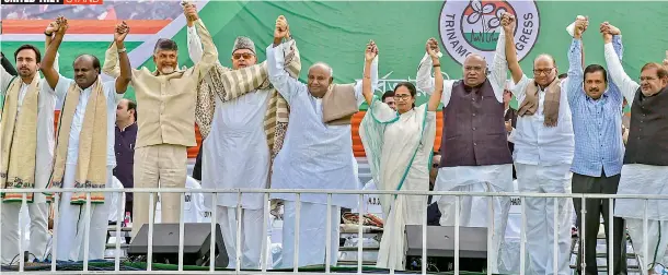  ?? —PTI ?? West Bengal Chief Minister Mamata Banerjee, H.D. Deve Gowda, Andhra Pradesh CM N. Chandrabab­u Naidu, Karnataka CM H.D. Kumaraswam­y, Congress leader Mallikarju­n Kharge, Sharad Pawar, Sharad Yadav and Delhi Chief Minister Arvind Kejriwal join hands during the TMC mega rally in Kolkata, Saturday.